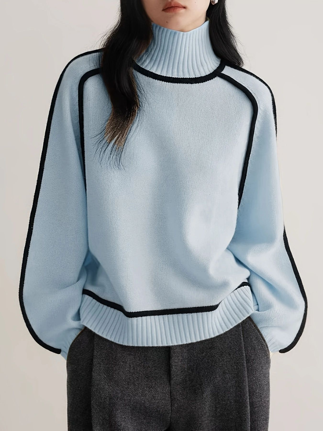 THERESA – RELAXED HIGH-NECK SWEATER